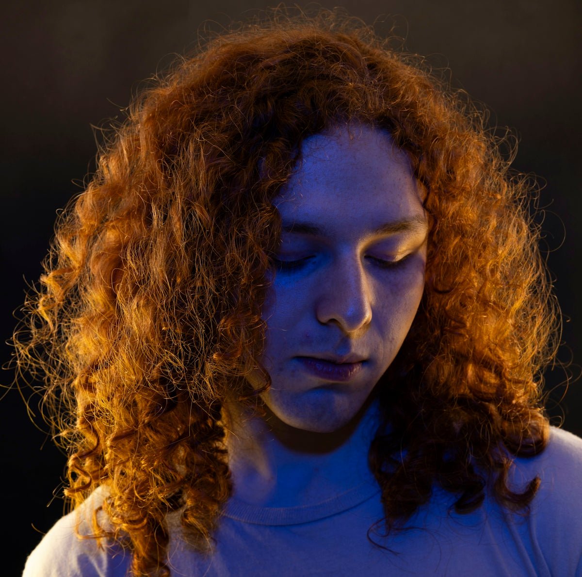 A man with curly red hair.