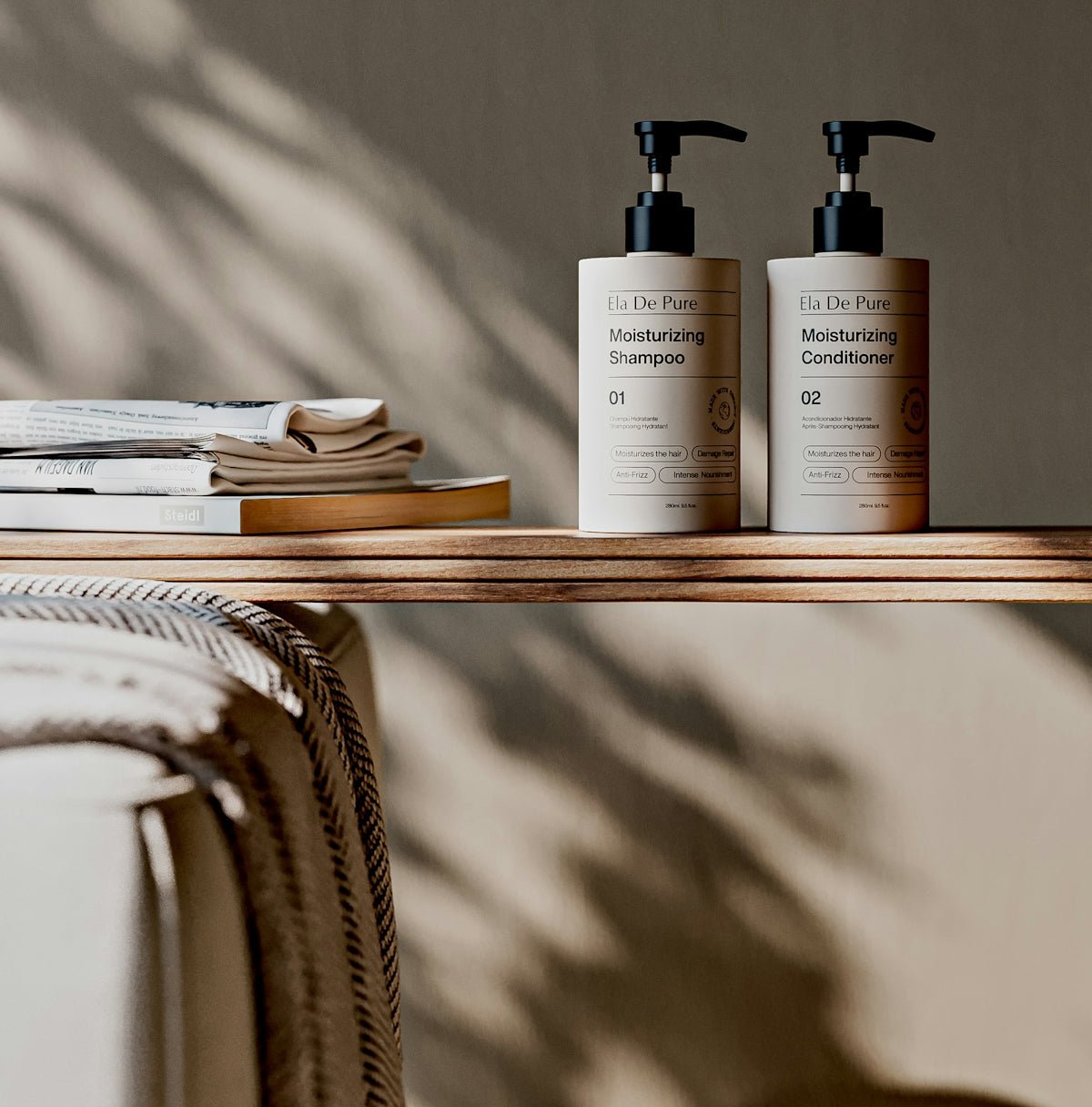 Shampoo and conditioner sit on a wooden shelf.