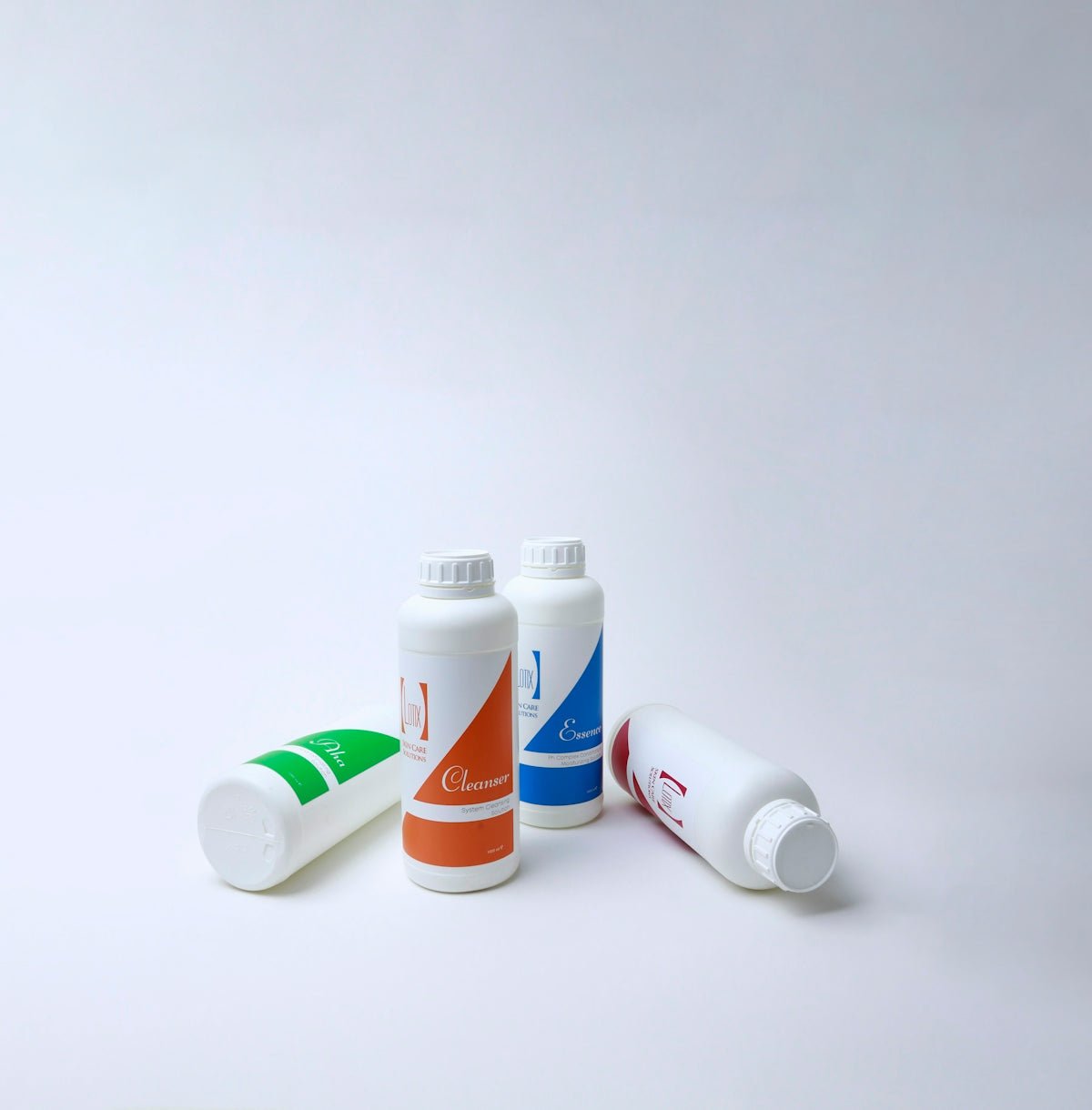 a group of different sized and shaped bottles