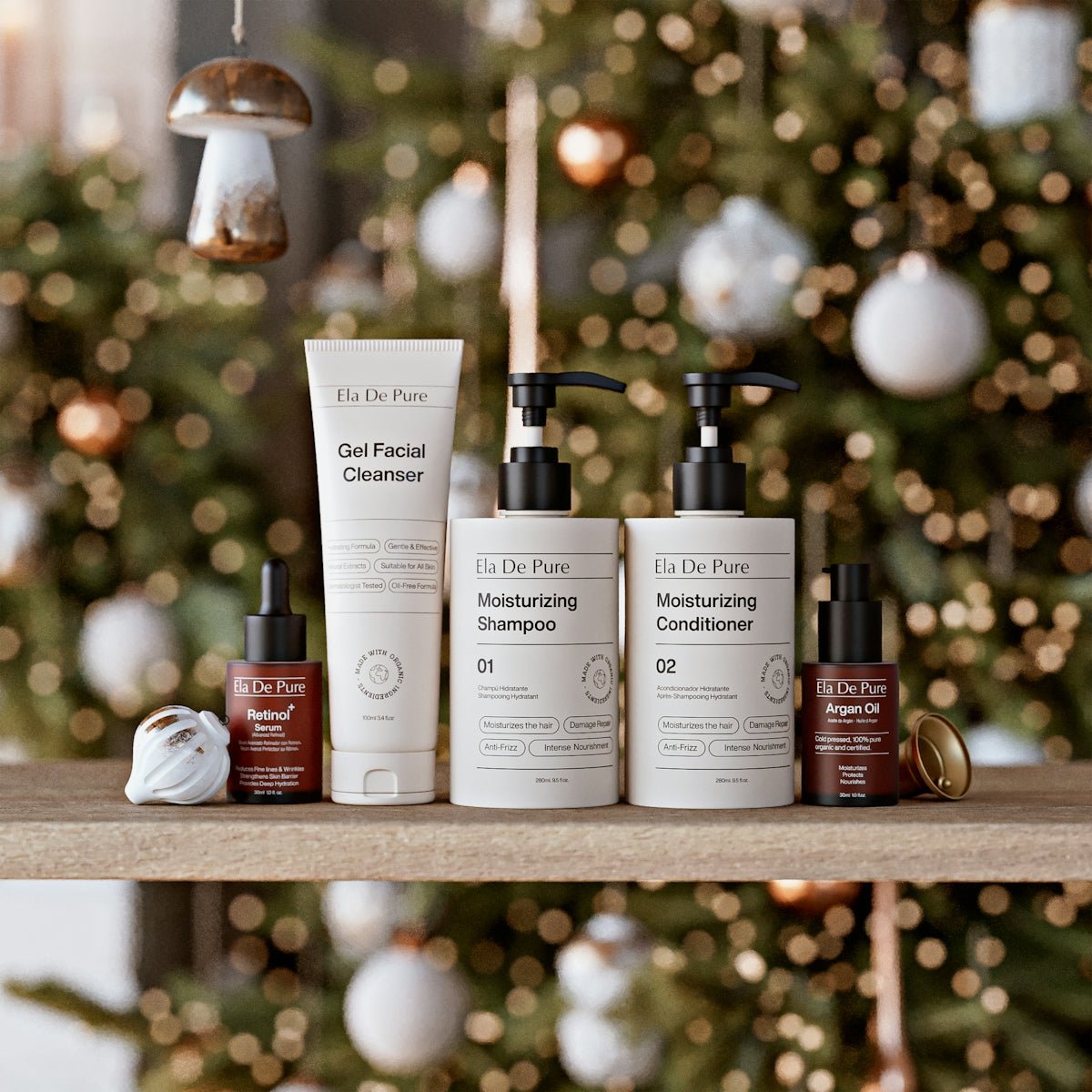 Skincare products displayed on a shelf with christmas tree background