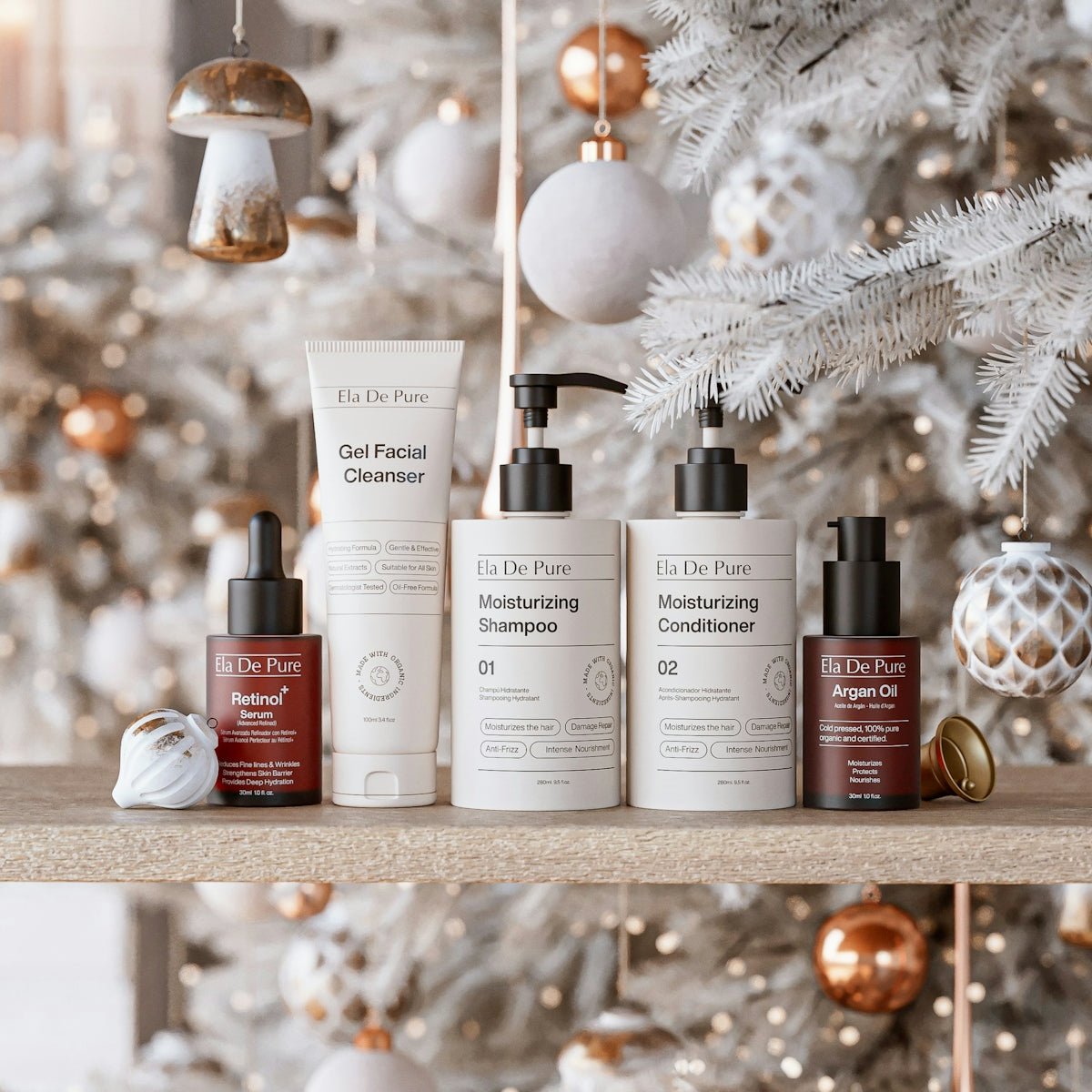 Skincare products arranged on a shelf with christmas decorations.